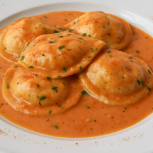 sorrentinos con salsa mixta